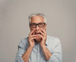 © grinny - Scared afraid senior man fear.