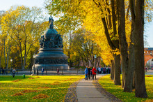 The Bronze Monument Millennium Of Russia In Autumn Sunset And People Walking In The Autumn Park In Veliky Novgorod, Russia