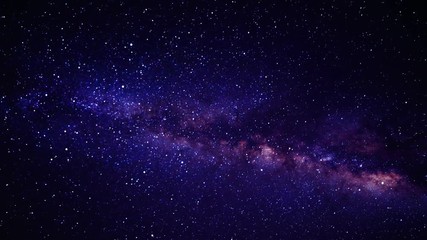 a view of outer space flying between the stars in a galaxy