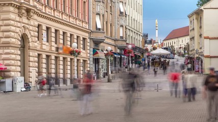 Wall Mural - Street with historic buildings in citycentre and Holy Mary monument in front of the Cathedral timelapse in Zagreb, Croatia