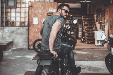 Wall Mural - Feeling comfortable on his bike. 