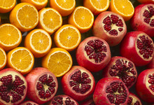 Fresh Oranges And Pomegranat