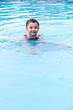 Leinwandbild Motiv Asian Chinese Little Boy Swimming In The Pool
