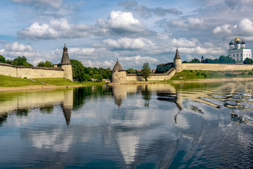 Wall Mural - View of the Pskov Kremlin from Velikaya River in the summer in a sunny weather