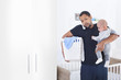 © tiagozr - Single father overwhelmed by taking care of everything alone with copy space