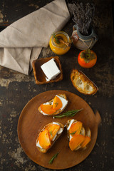 Wall Mural - Ciabatta Bread with honey, persimmon and rosemary