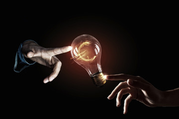 Wall Mural - hand pointing light bulb . mixed media