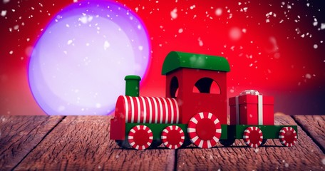 Poster - Composite image of train model with gift