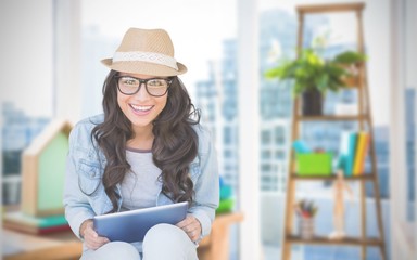Poster - Composite image of brunette with tablet pc
