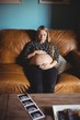 © Wavebreak Media - Pregnant woman relaxing in living room