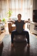 © Wavebreak Media - Pregnant woman performing stretching exercise on fitness ball in