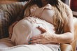 © Wavebreak Media - Mid section of pregnant woman relaxing in living room