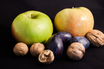 Canvas Print - apple and plum and walnuts