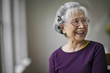 © Erickson Stock - Portrait of a smiling senior woman at a doctor's office.
