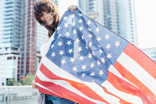 Young Beautiful Woman Waving An US Flag Brooklyn . New York City US
