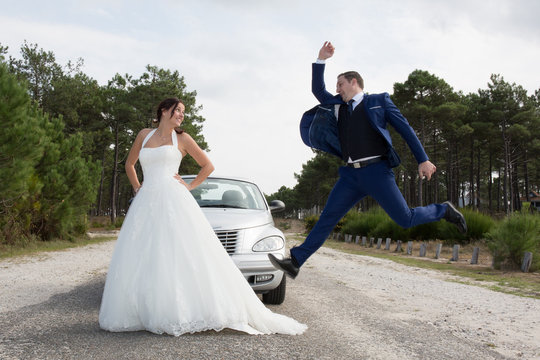 Happiness jump of groom on the wedding day