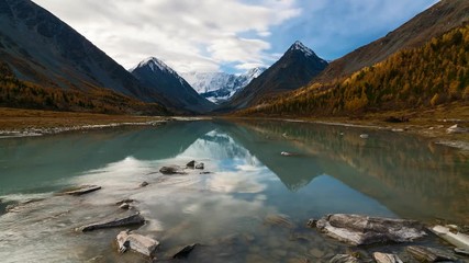 Wall Mural - Time Lapes. Belukha Mountain and Highland Lake Akkem in autumn. Altay Mountains, Russia.