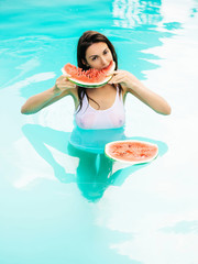 Canvas Print - sexy woman with watermelon in pool