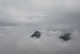 Fototapeta Na ścianę - Beautiful landscape with Kitzbuhel mountain peak in the mist, Tirol, Austria