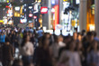 Crowd of people moving on the night street in Seoul - south Korea -  blurred abstract image