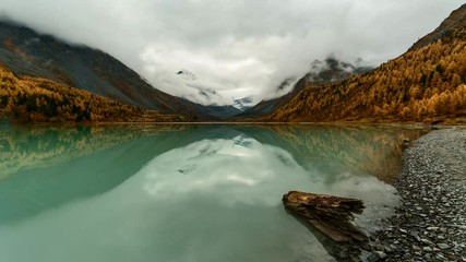 Wall Mural - Time Lapse. Belukha Mountain and Highland Lake Akkem in autumn. Altay Mountains, Russia.