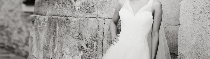 classic wedding photo of happy bride in black and white