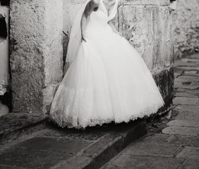 classic wedding photo of happy bride in black and white