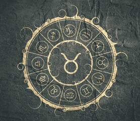 Wall Mural - Astrological symbols in the circle. Concrete wall textured Bull sign