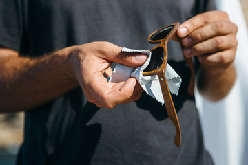 Polishing lens of wooden sunglasses