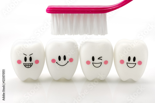 Fotomural Toys teeth in a smiling mood isolated on white background with clipping path
