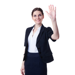 Smiling businesswoman standing over white isolated background