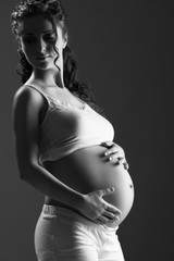 Wall Mural - belly of pregnant woman monochrome