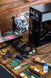 Computer components, parts, repair equipment. On a wooden background.