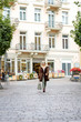 © g215 - Young woman walking on the street