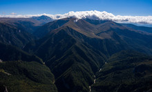 Aerial View Of The Beautiful Mountain Valley With River.