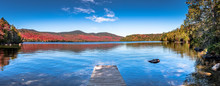 Panoramic View Of Lake Placid In The Adirondacks On A Bright Sunny Day With Colorful Autumn Foliage
