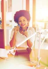 Wall Mural - businesswoman calling on smartphone at office