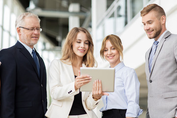 Sticker - business people with tablet pc computers at office