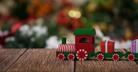 Poster - Composite image of train set with gift boxes