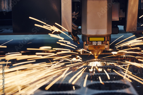 Fotografie, Obraz plasma or laser cutting metalworking with sparks