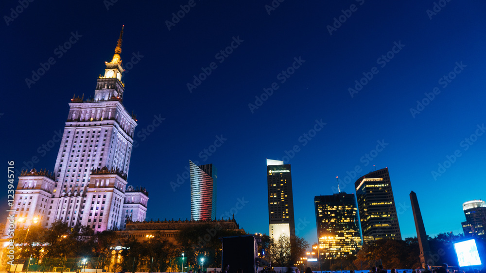 Warsaw, Poland. City center with Palace of Culture and Science, a landmark and symbol of Stalinism and communism, and modern sky scrapers.