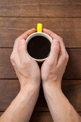 Poster - Man holding a cup of coffee