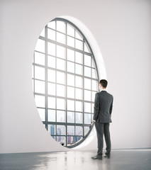 Poster - Businessman looking out of window