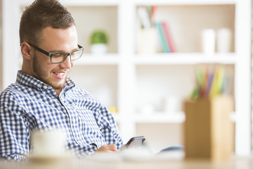 Poster - Young businessman using cellphone