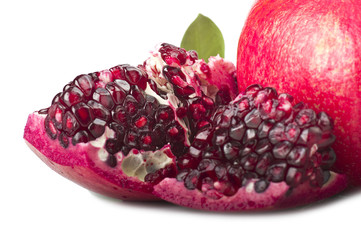 Wall Mural - ripe pomegranate fruit and its grains on white background