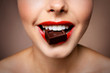 Girl eating chocolate, closeup