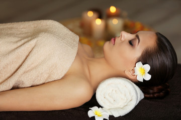 Young beautiful woman in spa salon