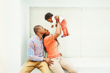 happy african family at their own house