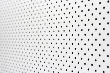 Canvas Print - White pegboard background