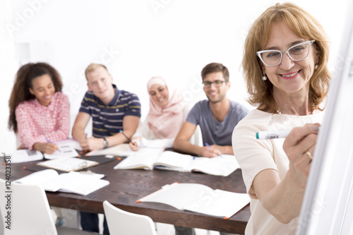 Young students and  their teacher Canvas Print